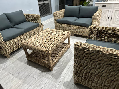 Grey cushion wicker couches and coffee table