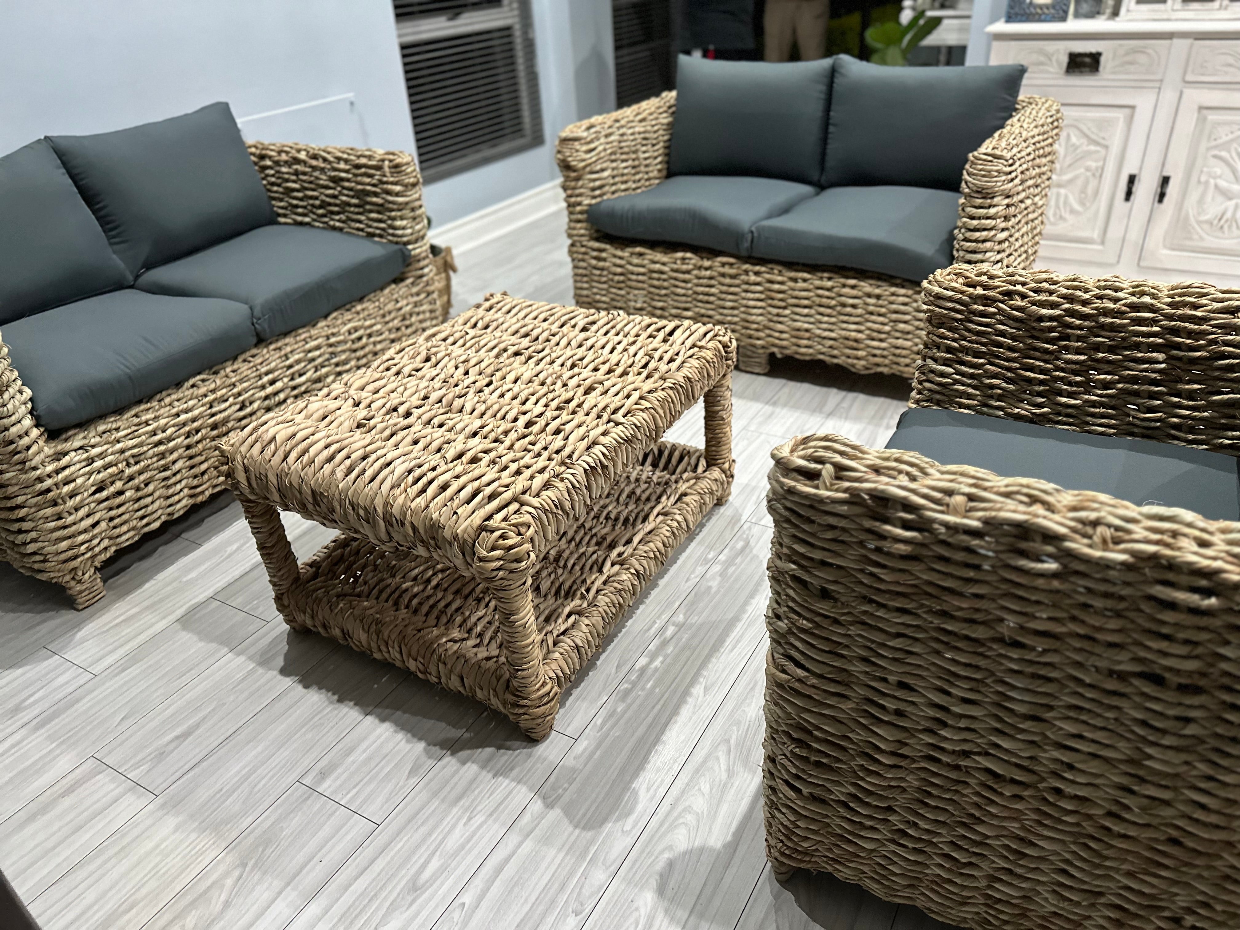 5 seater wicker lounge suite with grey cushions and coffee table