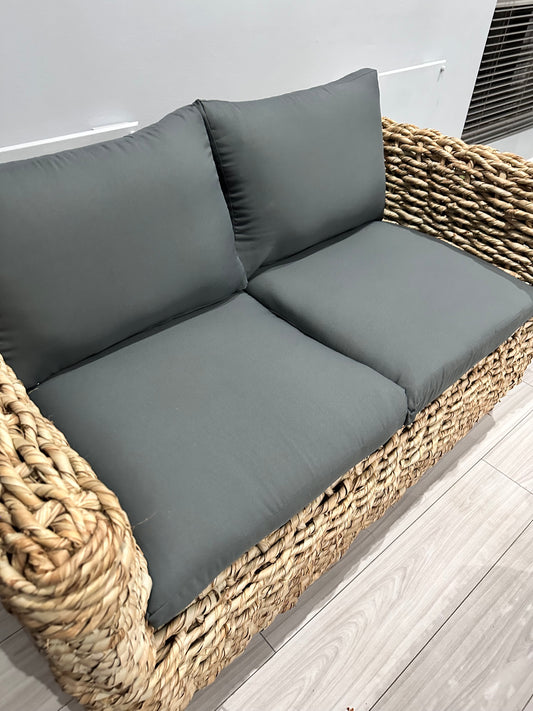 Double seater Wicker Couch with grey cushions